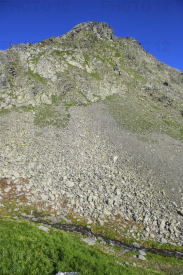 Smaller pieces of rock Rock stones lie eroded rock lies after landslide due to erosion on