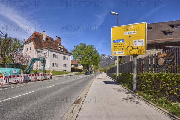 Signposts to Lofer, Inzell, Salzburg and Freilassing, road, house, lantern, trees, lawn, fenced-off