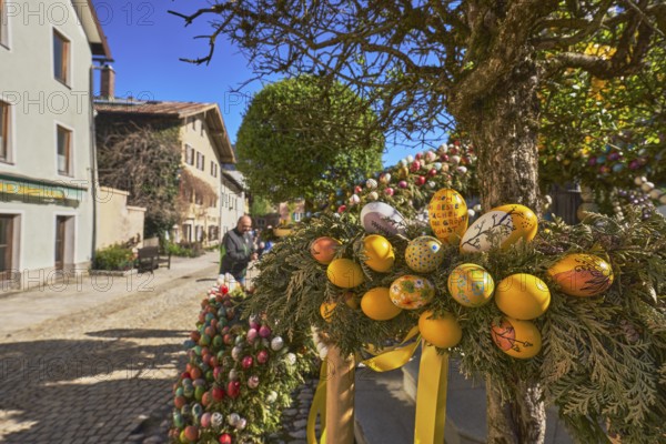 Easter fountain, Easter decoration, blown out coloured Easter eggs, historical building, depth of