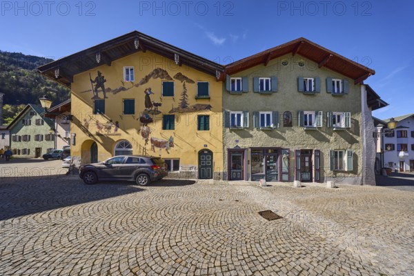 Historic buildings, facade, windows, doors, aerial painting, square, cobblestones, cars, blue sky,