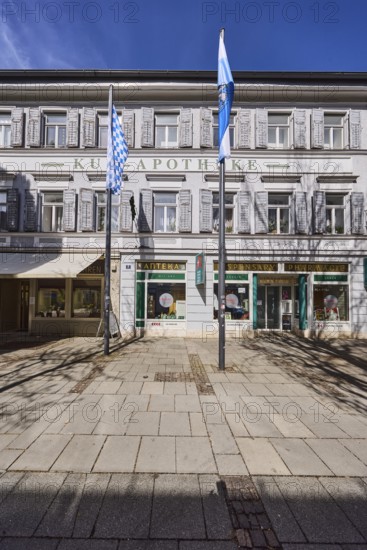 Kur-Apotheke, historical pharmacy, building, flagpoles, flags, facade, windows, entrance, doors,