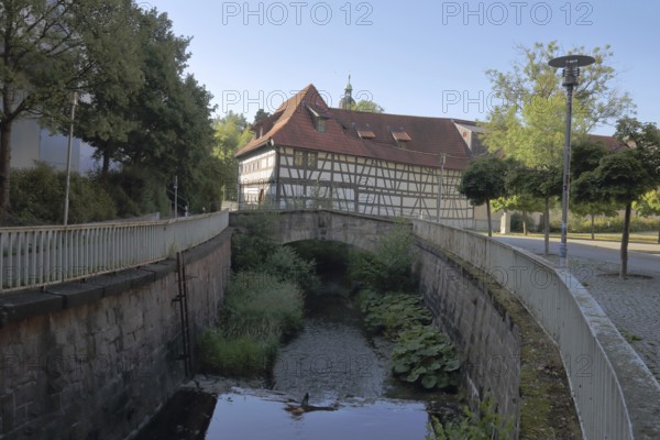 Armoury museum built in 1668, half-timbered house, back, bridge over the Lauter, stream, Suhl,