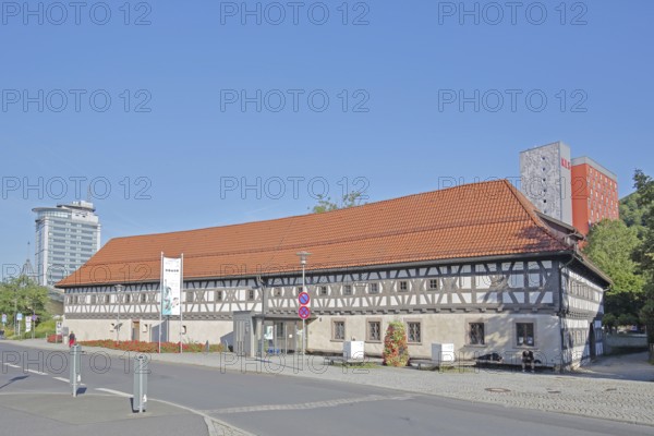 Armoury museum built in 1668, half-timbered house, museum, modern high-rise city hotel, Suhl,
