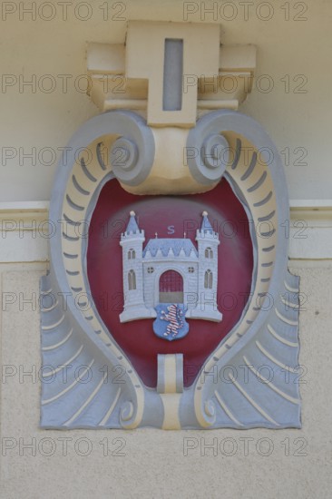 City coat of arms with volutes, detail, primary school, Schmalkalden, Franconia, Thuringia, Germany