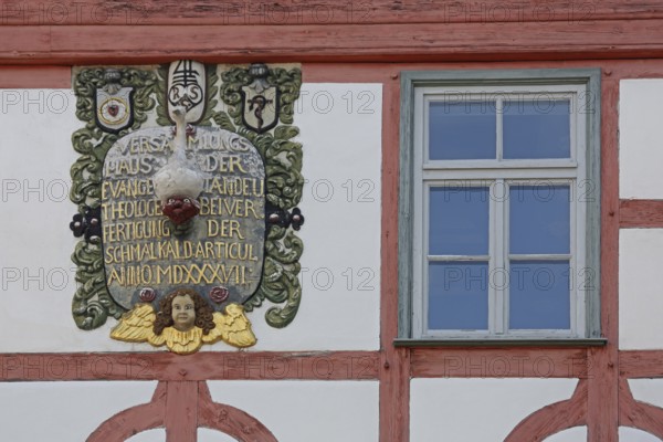 Monument with inscription : assembly house protestant, anno, roman, year, 1537, decorations,