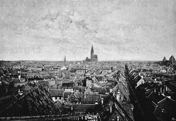 Cityscape of Strasbourg with Strasbourg Cathedral, sea of houses, streets, Alsace, France,