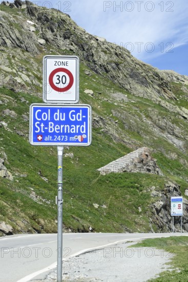 Traffic sign zone 30 at the border crossing from Italy to Switzerland at the Alpine pass Grenzpass