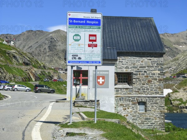 View of front sign with information for customs clearance at historic Swiss border building Border