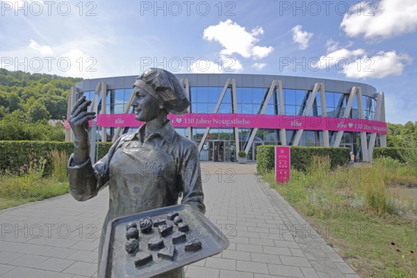 Sculpture confectioner with tray full of pralines for tasting, presentation, eating, enjoyment,