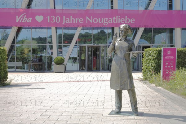 Sculpture confectioner with tray full of pralines for tasting, presentation, eating, enjoyment,