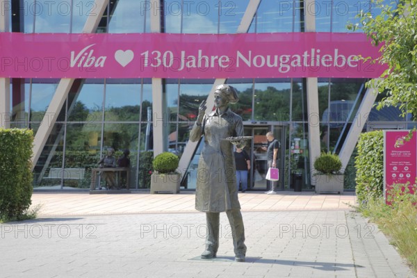 Sculpture confectioner with tray full of pralines to taste, presentation, eat, enjoyment, pleasure,
