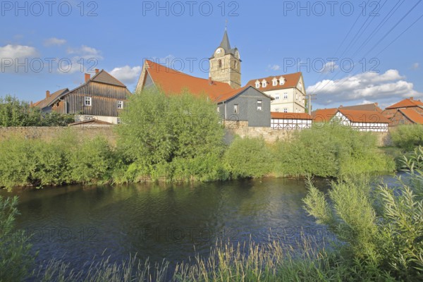 St Bartholomew's Church and Werra, bank, houses, idyll, Themar, cobblestone, Thuringia, Germany