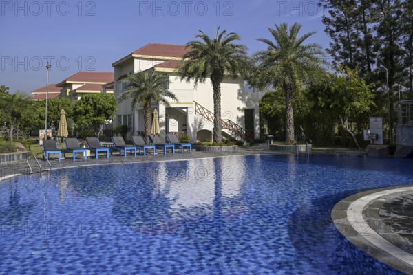 Swimming pool of the Resort De Coração, near Ramnagar, Corbett National Park, Uttarakhand State,