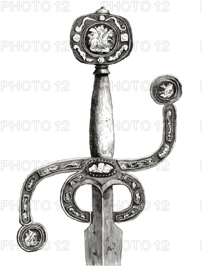 English sword, circa 1580, with very rare flat pommel and curved S-hilt, inlaid with silver. The
