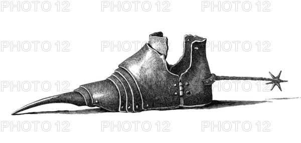 A sabaton, iron shoe or armoured shoe or solleret, from the year 1400 AD, from the book The British