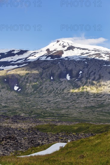 Snow-covered volcano Snæfellsjökull, Snäfellsjökull, Snaefellsjökull glacier, spring clouds,