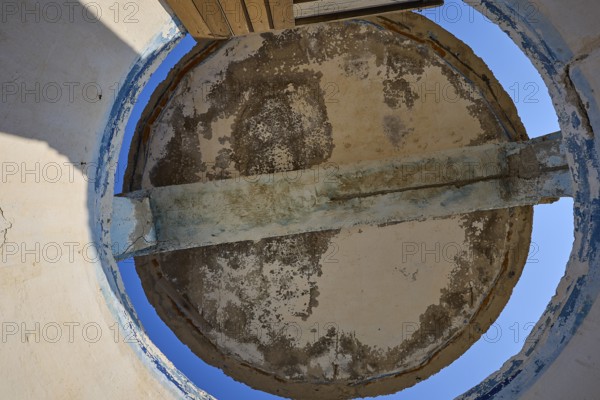 View from below of a dilapidated round roof structure with open sky, Lost Place, Lago anti-aircraft