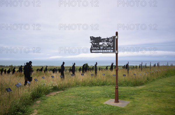Installation, sign Utah Beach, Standing with Giants, honours the victims of the fallen British