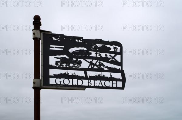 Installation, sign Gold Beach, Standing with Giants, honours the victims of the fallen British