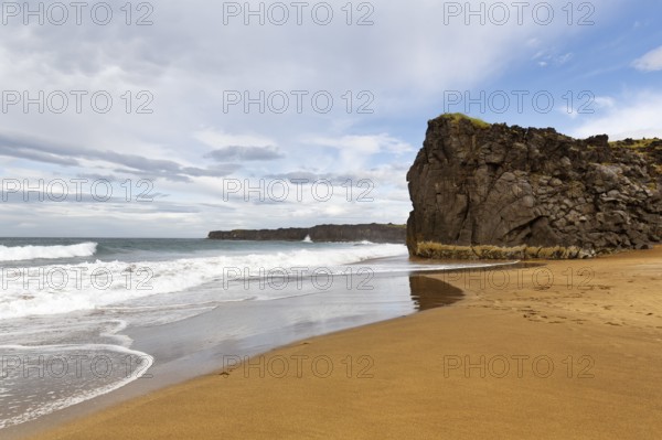 Skarðsvík Beach, golden sandy beach and cliffs, coastal landscape with bay, Skardsvik,