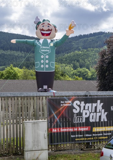 Moving advertising figure, with beer glass, for the shooting festival of the Schützenverein