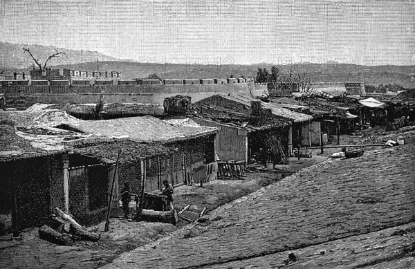 Kashgar or Kaxgar, traditional clay buildings with thatched roof, castle-like complex with circular