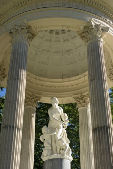 Statue of Venus with Cupid in the Temple of Venus above the terraced gardens, park of Linderhof