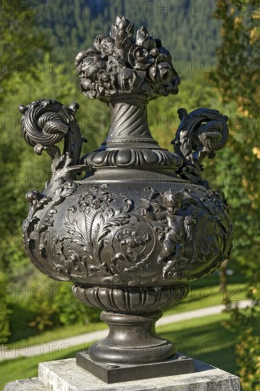Vase with putti and ornaments, decorative ceramic vessel in Rococo style, west parterre, park of