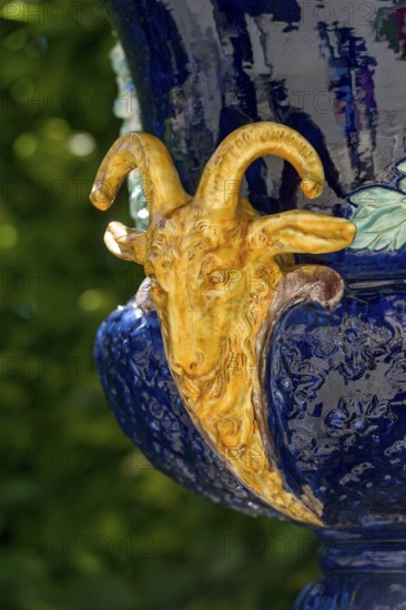 Head of a ram on a vase, ornamental vessel made of glazed ceramic in the Rococo style, west