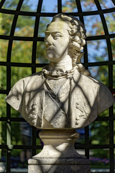 Decorative bust, nobleman in rococo style in the arcade, park of Linderhof Castle, UNESCO World