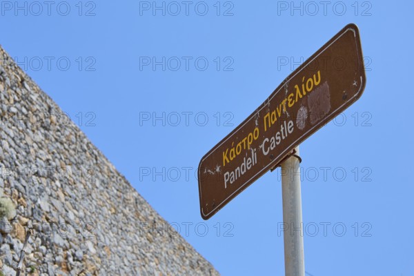 Signpost to Pandeli Castle under a clear sky, Pandeli Castle, Castle, Leros Fortress, St John's