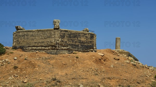 Abandoned concrete structure on a dry hill under a clear sky, Lost Place, Air Defence Position,
