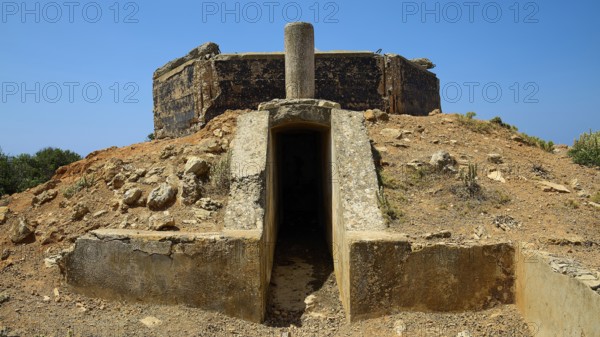 Entrance to a concrete structure on a rocky, dry hill, Lost Place, Air Defence Position, Aerophone,