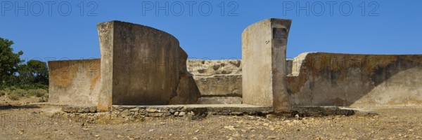 Dilapidated concrete wall structures in a dry, sunny environment, Lost Place, Air Defence Position,