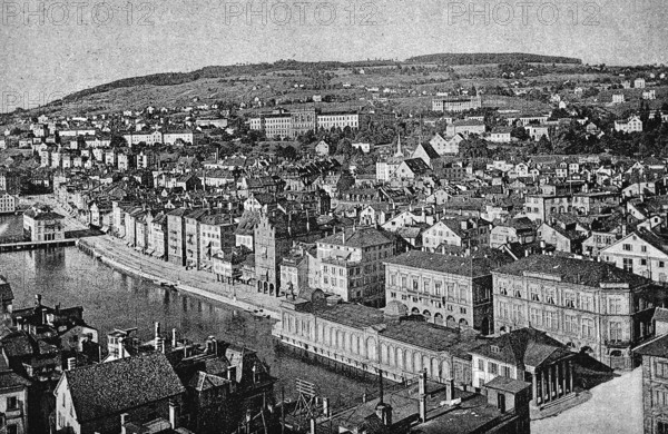 Cityscape of Zurich, view from the old town church of St Peter, old town on the Limmat, mountain,