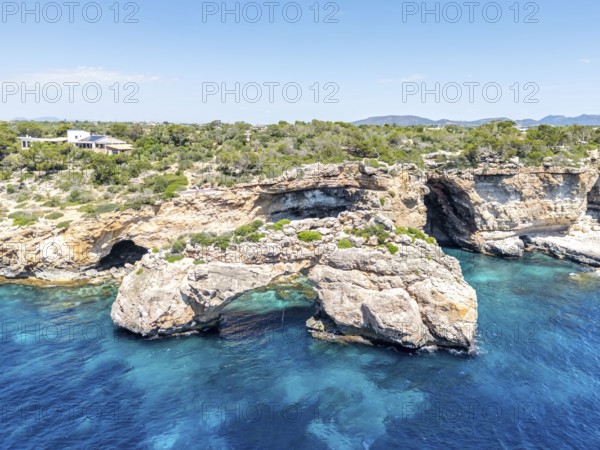 Es Pontas rock gate near Cala Santanyi on the island of Majorca in the Mediterranean Sea,