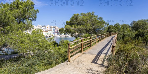 Portocolom fishing village on Majorca with boats and colourful houses Holiday by the sea Panorama