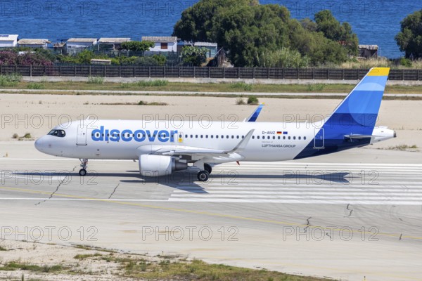 An Airbus A320 aircraft of Discover Airlines with the registration D-AIUZ at Rhodes Airport, Greece