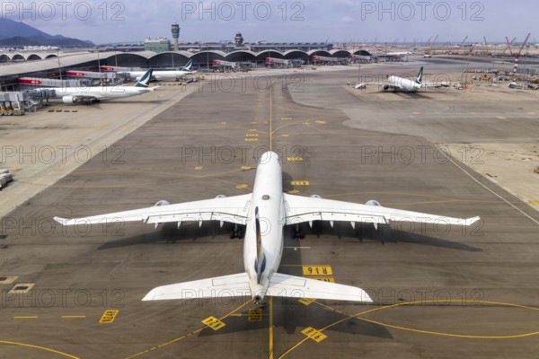A Lufthansa Airbus A340-600 aircraft with the registration D-AIHW at Chek Lap Kok Airport (HKG) in