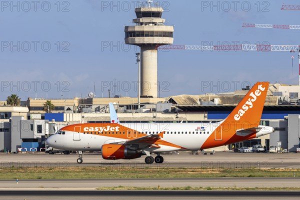 An EasyJet Europe Airbus A319 aircraft with the registration number OE-LQE at Palma de Majorca