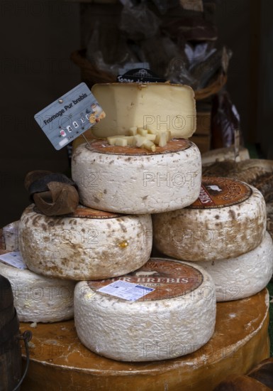 Display, offer, cheese, various cheeses, food, at the medieval market, Bayeux, Normandy, Calvados,