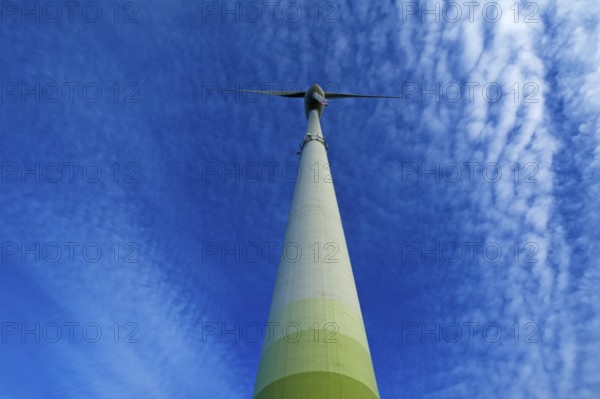 Wind turbine with small fleecy clouds (cirrocumulus) in the sky, Karsberg, Upper Franconia,