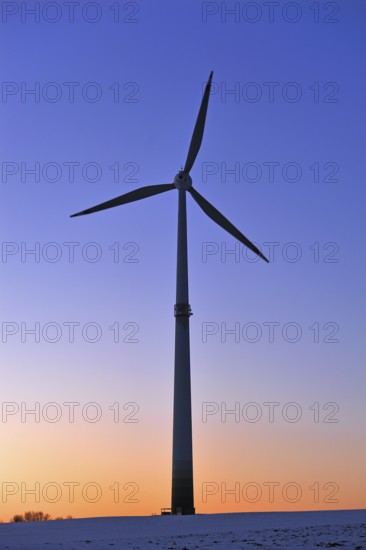 Wind turbine against the wintry evening sky, Karsberg, Upper Franconia, Bavaria, Germany, Europe,
