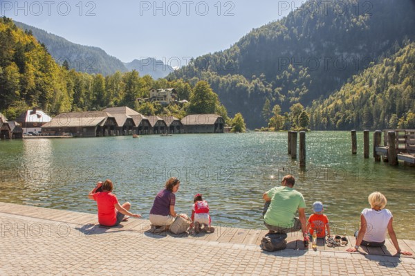 Tourists camp at Königssee, mountain lake in the municipality of Schönau am Königssee, district of