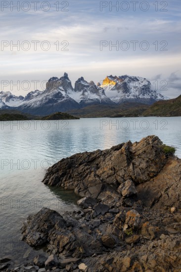 Cuernos del Paine mountain range at sunset, shore of Lago Pehoe, Torres del Paine National Park,