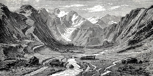 Pinzgau with high mountain valley, river course, agricultural farms, pass roads, snow-covered