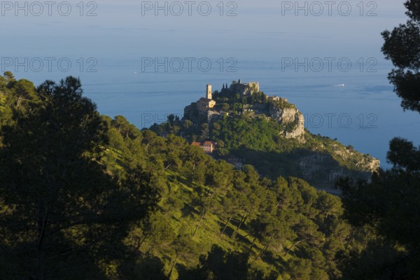 Picturesque mountain village above the sea, sunset, Èze, Cote d'Azur, Alpes-Maritimes,
