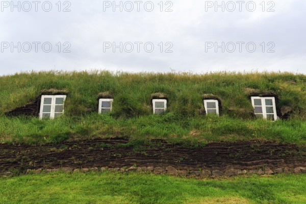 Grass sod house, window, green roof, peat farm or peat museum Glaumbaer or Glaumbær, open-air
