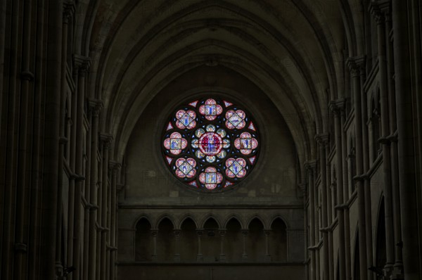 Rose window, coloured stained glass window, choir with altar, interior view, Église Notre-Dame
