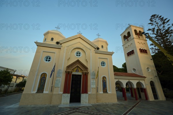 Church, Panagia Agia Paraskevi, Orthodox church with three towers and icons on the façade under a